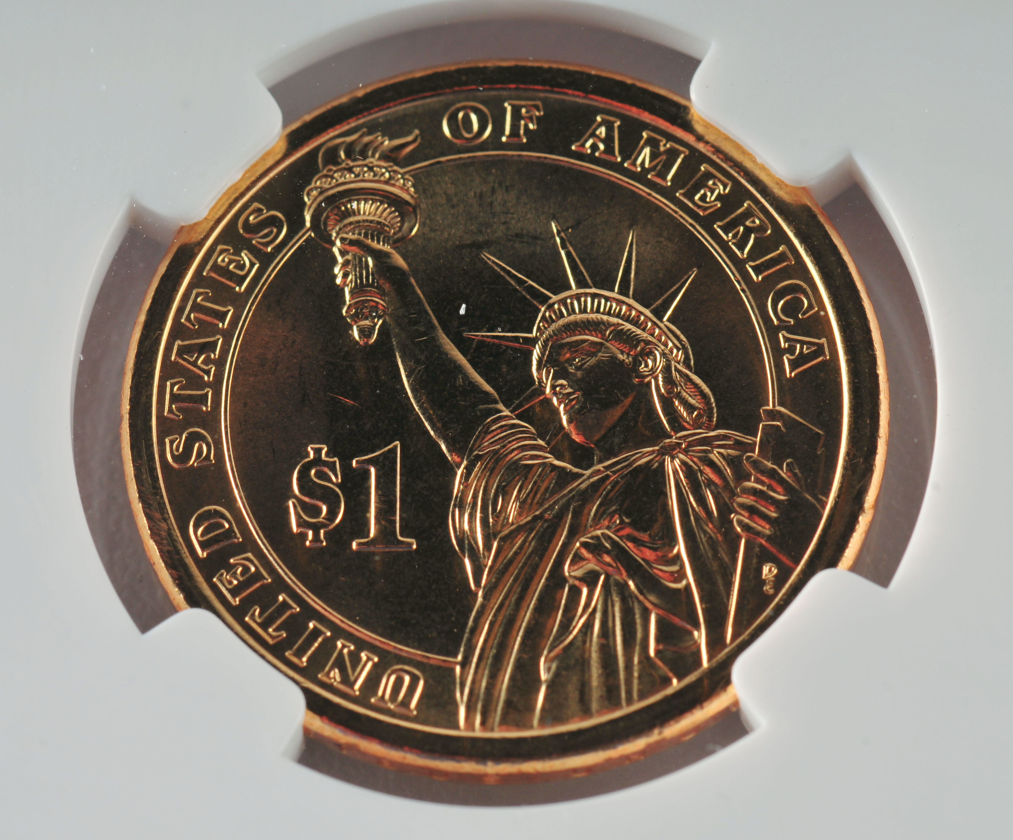 Encapsulated Brilliant uncirculated First Day of Issue (by NGC) 2007 P George Washington Golden one dollar coin