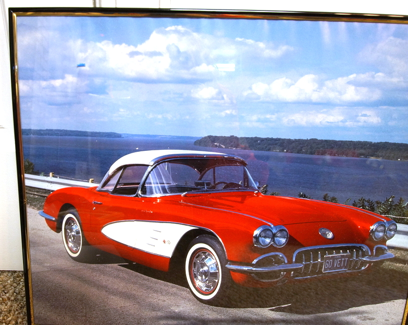 Four Framed Automotive Posters