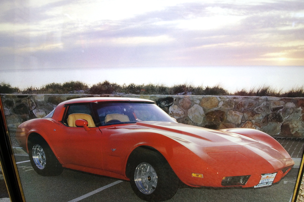 Four Framed Automotive Posters