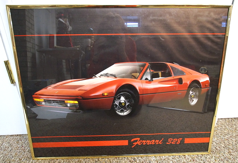 Four Framed Automotive Posters