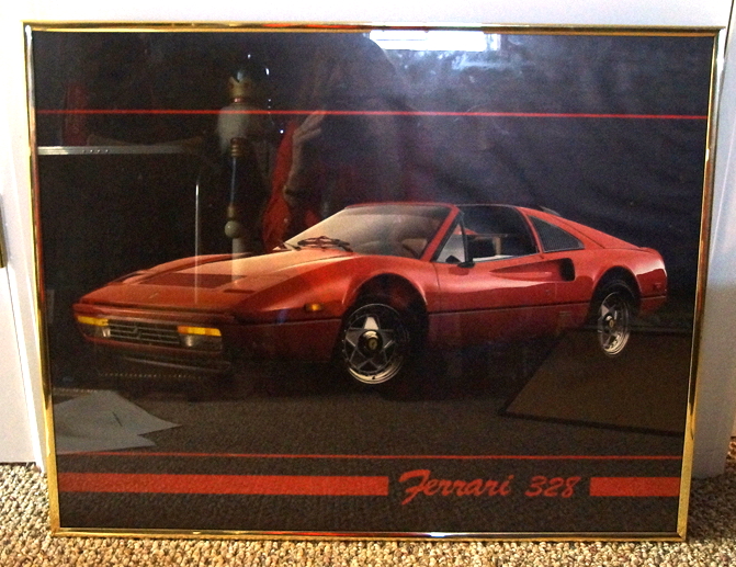 Four Framed Automotive Posters