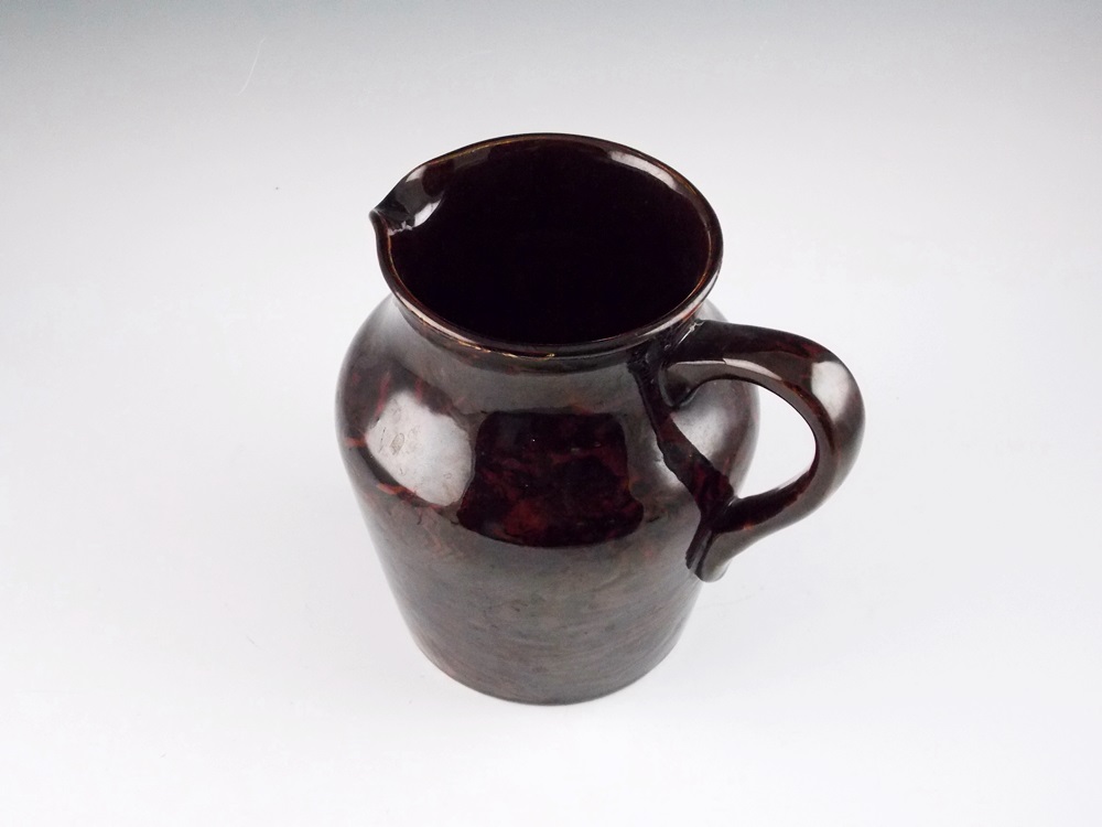 Vintage marbleized pottery pitcher