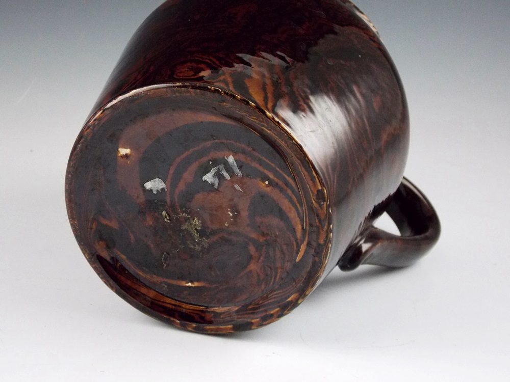 Vintage marbleized pottery pitcher