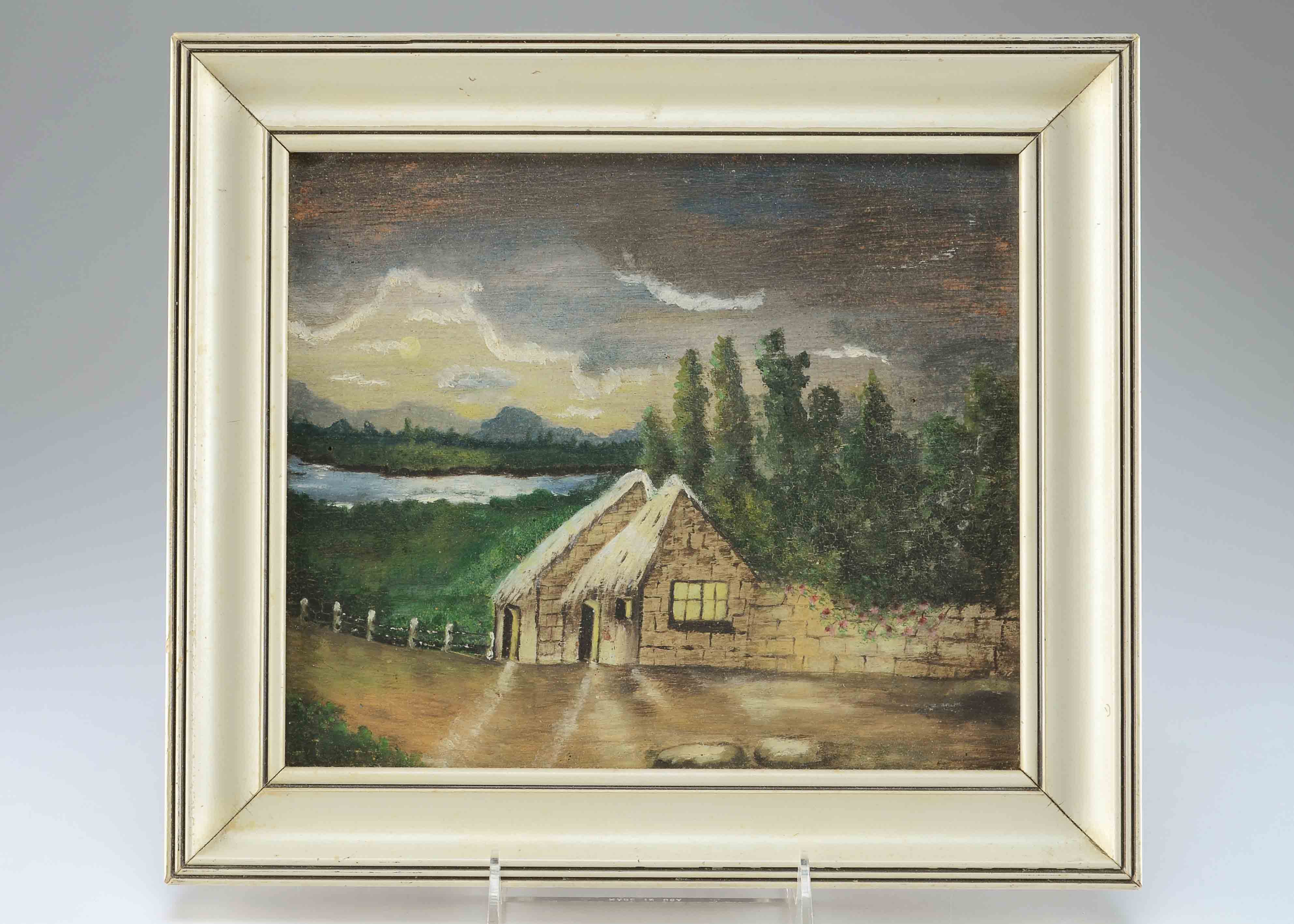 Framed landscape painting on wood