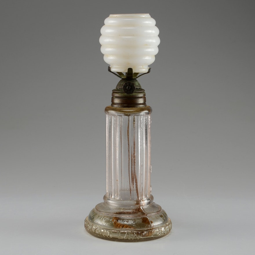 Circa 1880, a Grand Vals miniature oil lamp often called a 'Time lamp