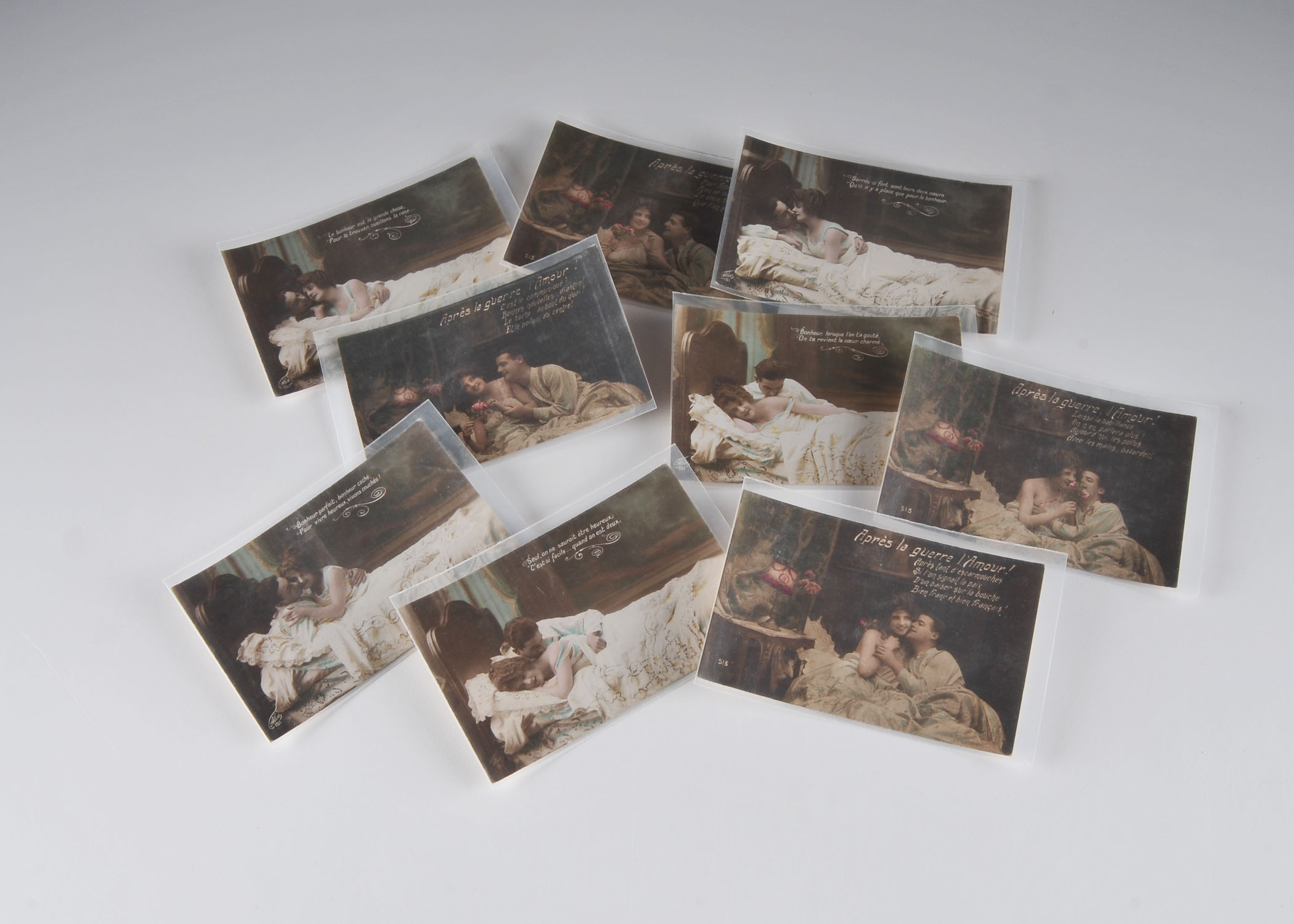 9 vintage sepia toned and hand colored Parisian "L'Amour" postcards 