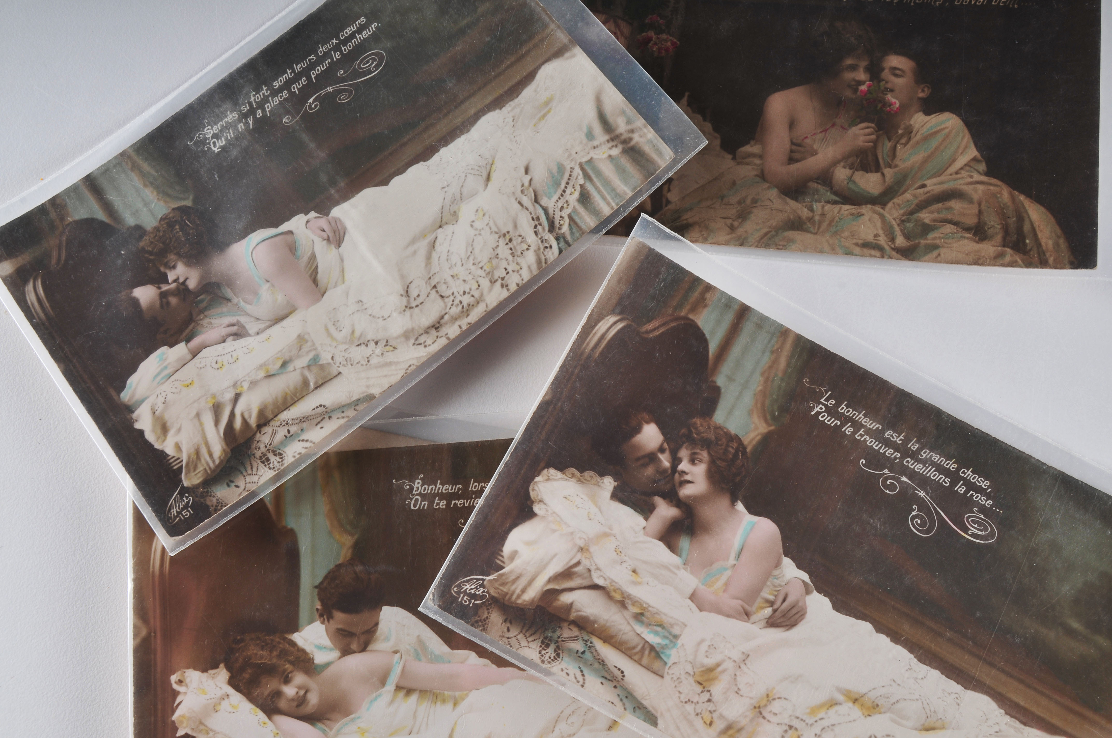 9 vintage sepia toned and hand colored Parisian "L'Amour" postcards 