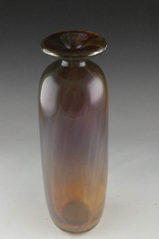 A tall hand blown art glass vase signed by artist, Robert Barber
