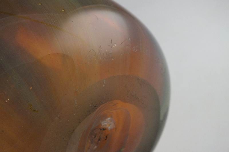 A tall hand blown art glass vase signed by artist, Robert Barber