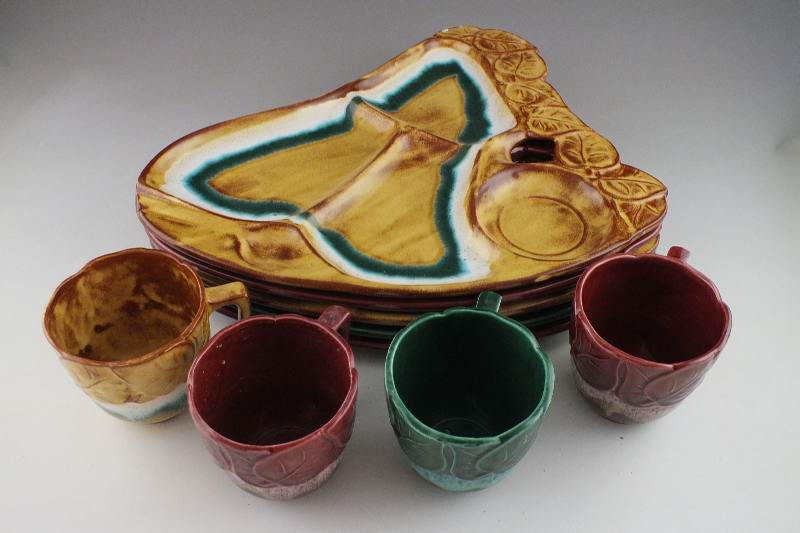 A set of five luncheon plates and 4 cups from California Pottery