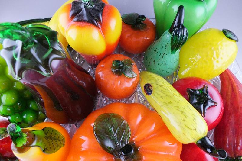 An amazing array of hand blown art glass fruit and vegetables