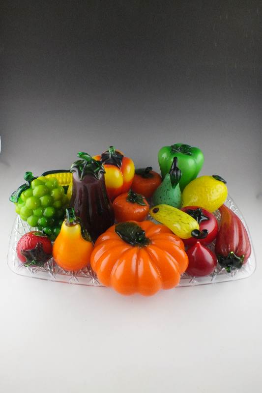 An amazing array of hand blown art glass fruit and vegetables