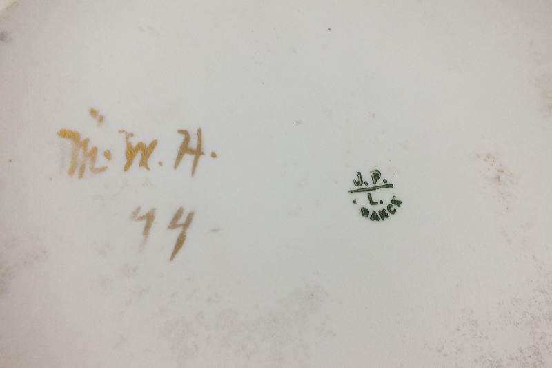 A lovely late 1800's hand painted leaf shaped tray with companion covered sugar bowl and cream pitcher