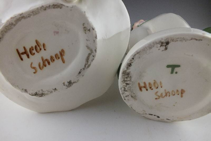 A pair of slip cast ceramic Dutch Boy and Girl planter figurines signed by California artist, Hedi Schoop circa  1950's