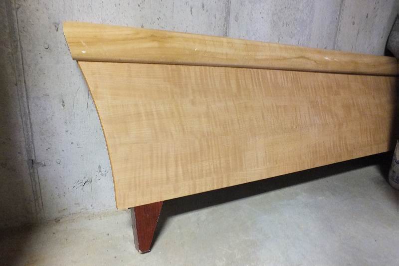Contemporary style Queen size Qtr. Figured Anigre veneer and laminated woodgrain head board and foot board from USA Pilliod Furniture Inc., Division of Ladd Furniture