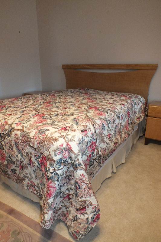 Contemporary style Queen size Qtr. Figured Anigre veneer and laminated woodgrain head board and foot board from USA Pilliod Furniture Inc., Division of Ladd Furniture