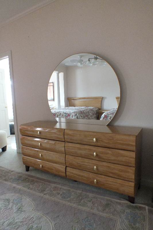 Contemporary style dresser with round detachable mirror from  USA Pilliod Furniture Inc., Division of Ladd Furniture
