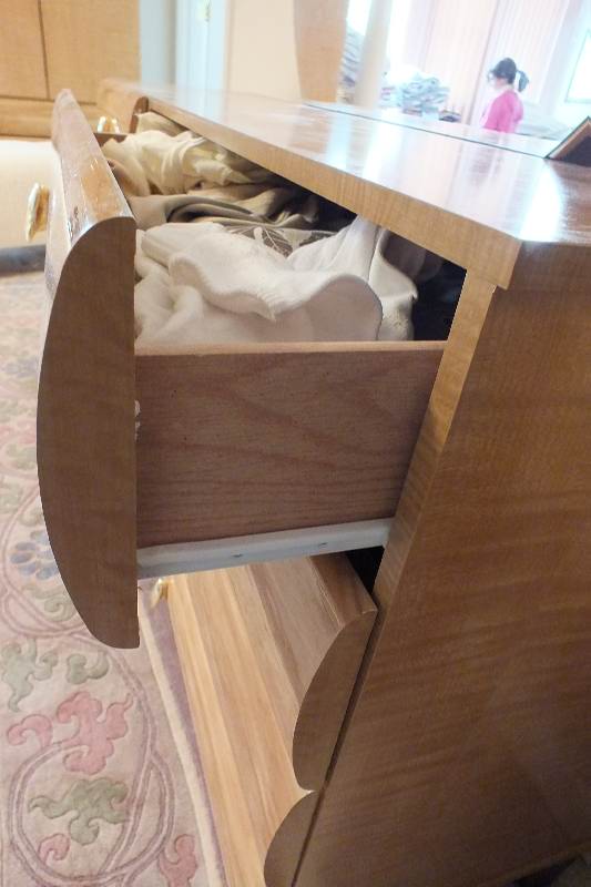 Contemporary style dresser with round detachable mirror from  USA Pilliod Furniture Inc., Division of Ladd Furniture