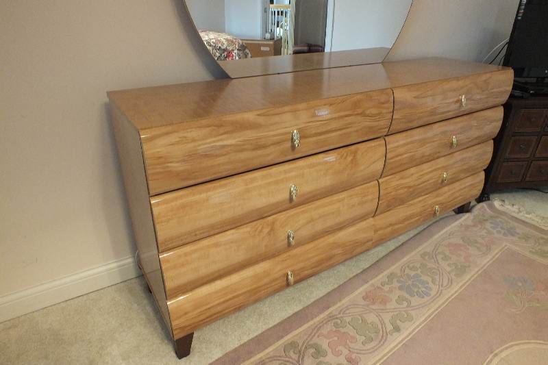 Contemporary style dresser with round detachable mirror from  USA Pilliod Furniture Inc., Division of Ladd Furniture