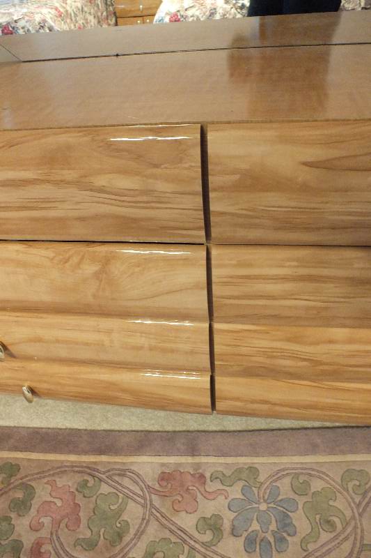Contemporary style dresser with round detachable mirror from  USA Pilliod Furniture Inc., Division of Ladd Furniture