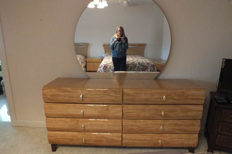 Contemporary style dresser with round detachable mirror from  USA Pilliod Furniture Inc., Division of Ladd Furniture