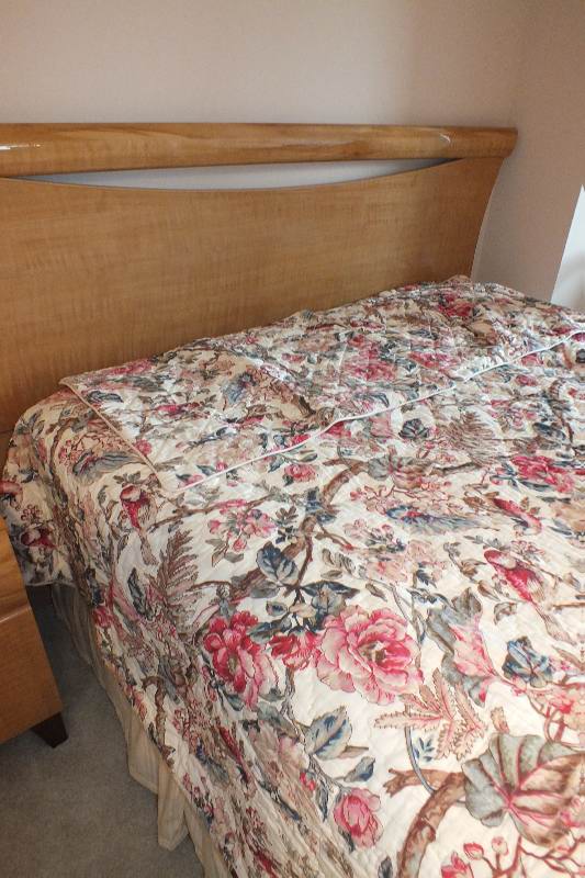 Contemporary style queen size Qtr. Figured Anigre veneer and laminated woodgrain head board and foot board from USA Pilliod Furniture Inc., Division of ladd Furniture