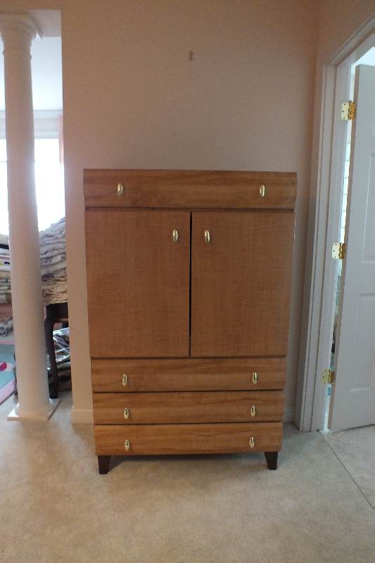 A Contemporary style Armoire from USA Pilloid Furniture, Division of Ladd Furniture