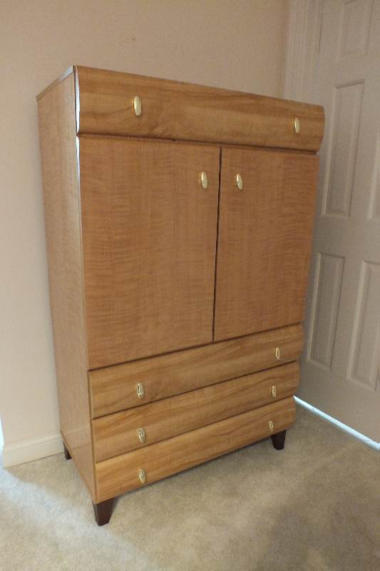 A Contemporary style Armoire from USA Pilloid Furniture, Division of Ladd Furniture