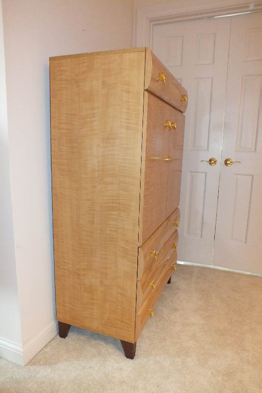 A Contemporary style Armoire from USA Pilloid Furniture, Division of Ladd Furniture