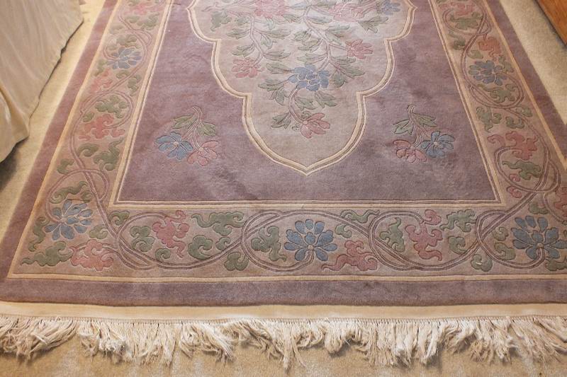 A Tian Tan 100 % wool pile genuine hand knotted oriental rug made in China Beiging, circa 1992