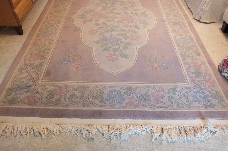 A Tian Tan 100 % wool pile genuine hand knotted oriental rug made in China Beiging, circa 1992