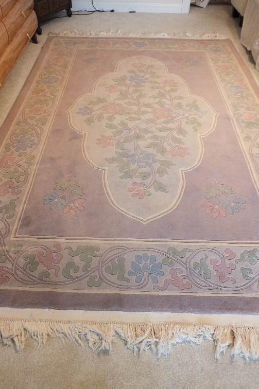 A Tian Tan 100 % wool pile genuine hand knotted oriental rug made in China Beiging, circa 1992