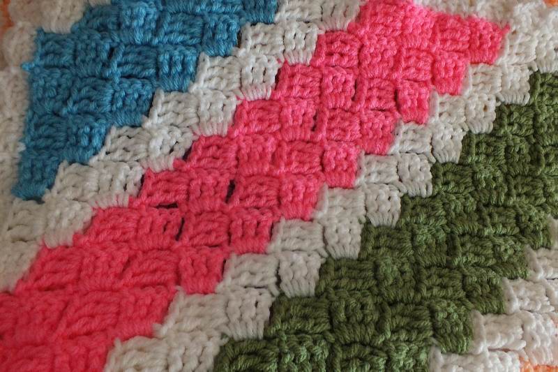 Four assorted twin size blankets