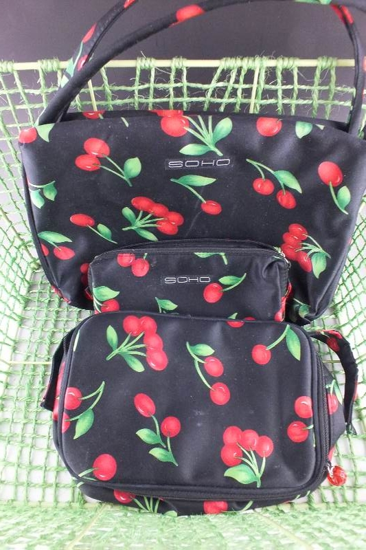 Three Vera Bradley colorful bags