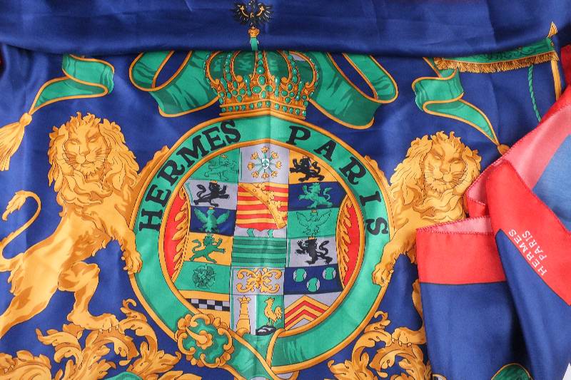 A lovely colorful silk scarf marked Hermes Paris