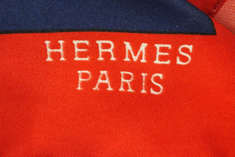 A lovely colorful silk scarf marked Hermes Paris