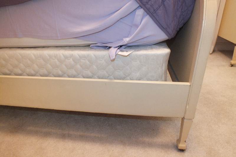 An Italianate style full size head board and foot board, both are designed with a lovely sloping arch