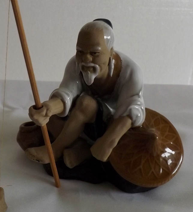 China Mud Man Fisherman