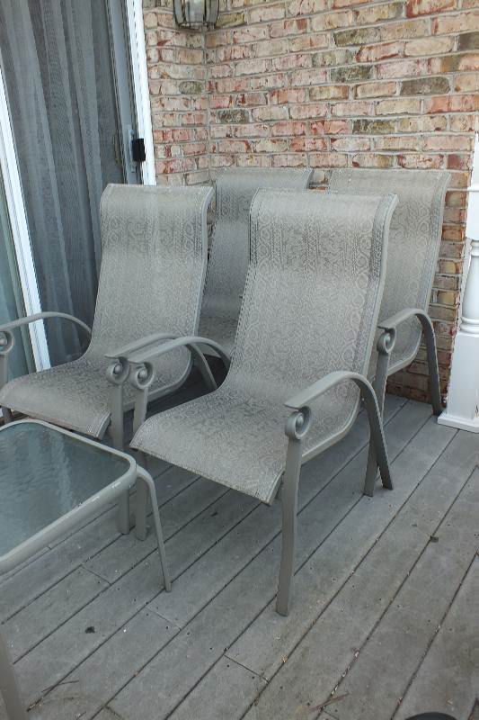 Four painted aluminum outdoor chairs