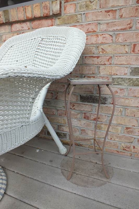 Five pieces of outdoor wicker like furniture