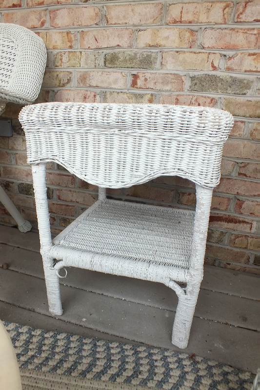 Five pieces of outdoor wicker like furniture