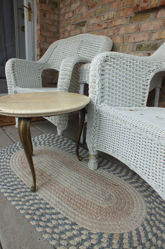 Five pieces of outdoor wicker like furniture