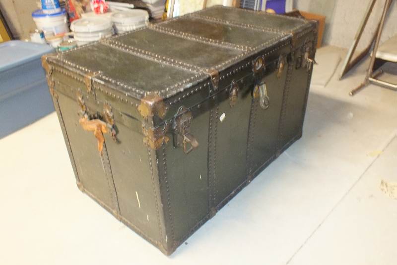 Large vintage metal steamer trunk