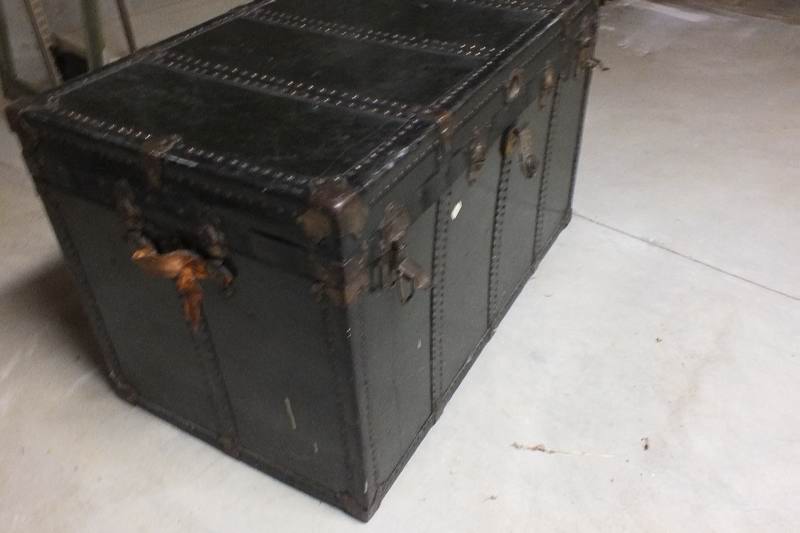 Large vintage metal steamer trunk