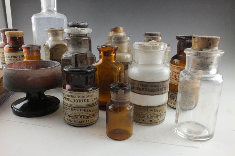 Antique glass bottles filled with Chemical compounds