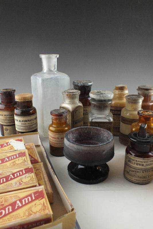 Antique glass bottles filled with Chemical compounds