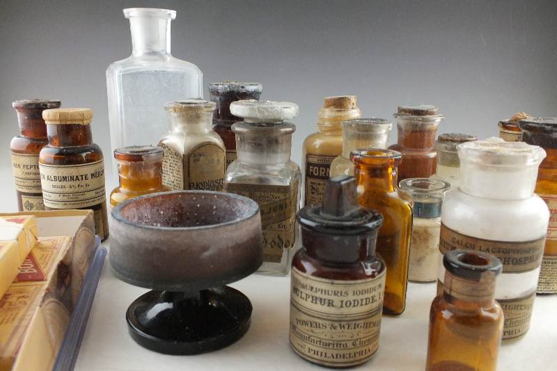 Antique glass bottles filled with Chemical compounds