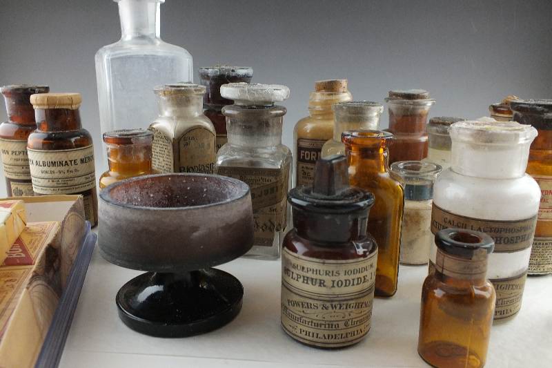 Antique glass bottles filled with Chemical compounds
