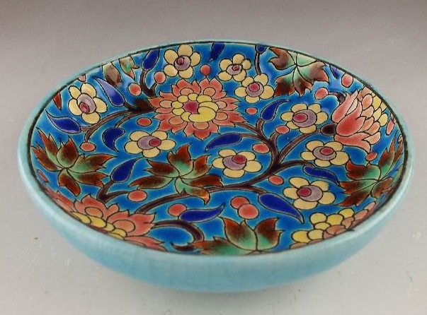 A lovely and colorful small ceramic dish marked "Longwy France, Decore a la Main, Made in France"
