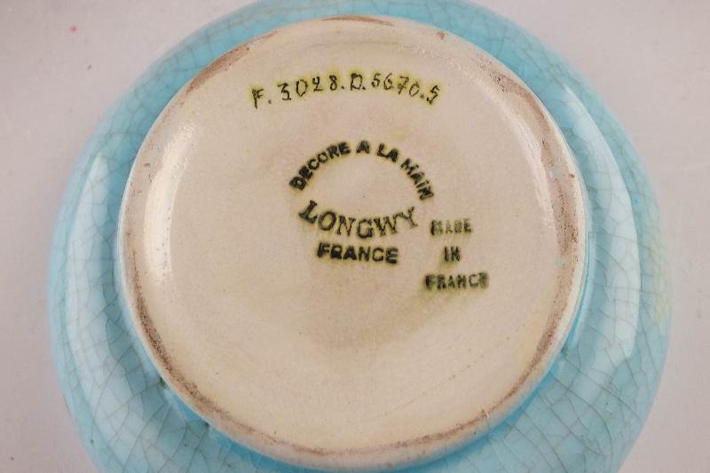 A lovely and colorful small ceramic dish marked "Longwy France, Decore a la Main, Made in France"